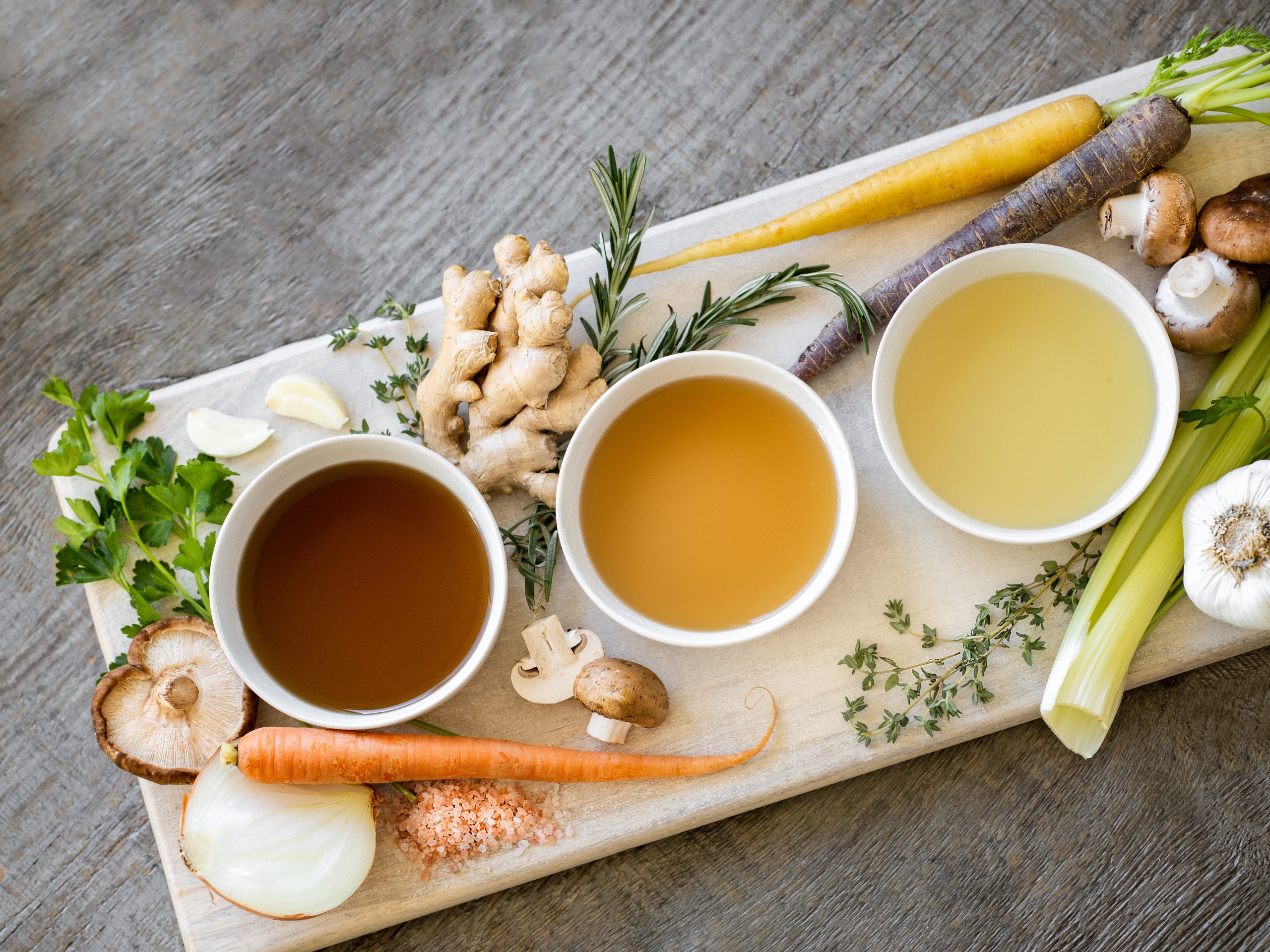 A steaming cup of herbal tea with dried flowers on a wooden table." This is great for accessibility and SEO.